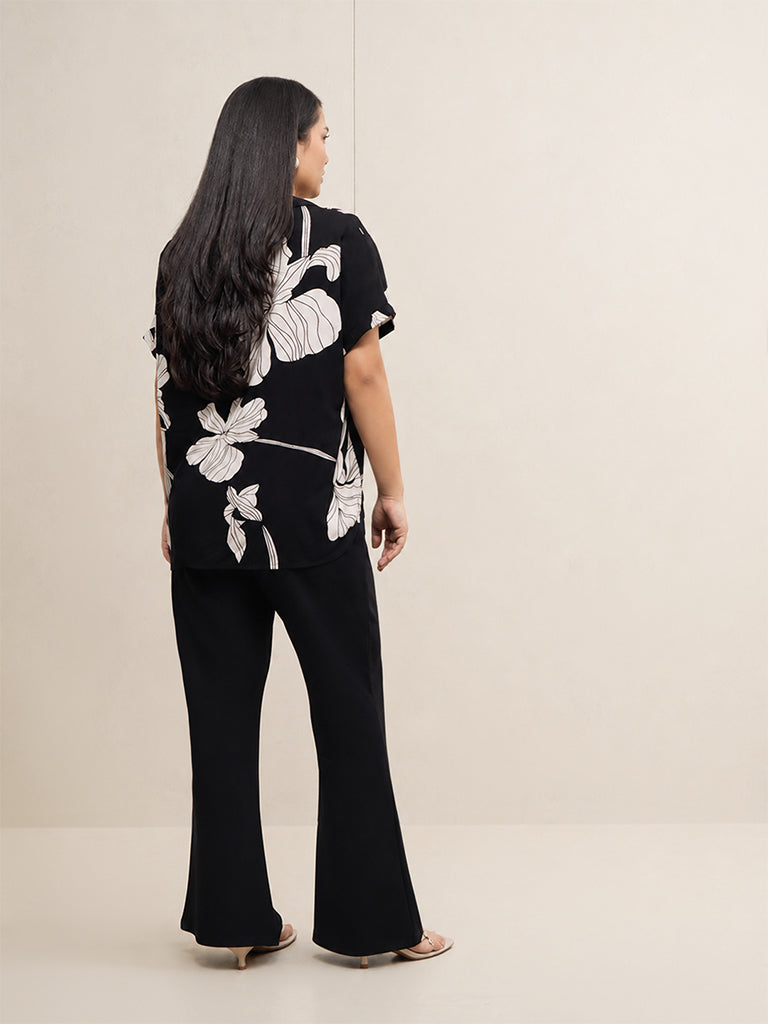Gia Black Solid High-Rise Flared Trousers
