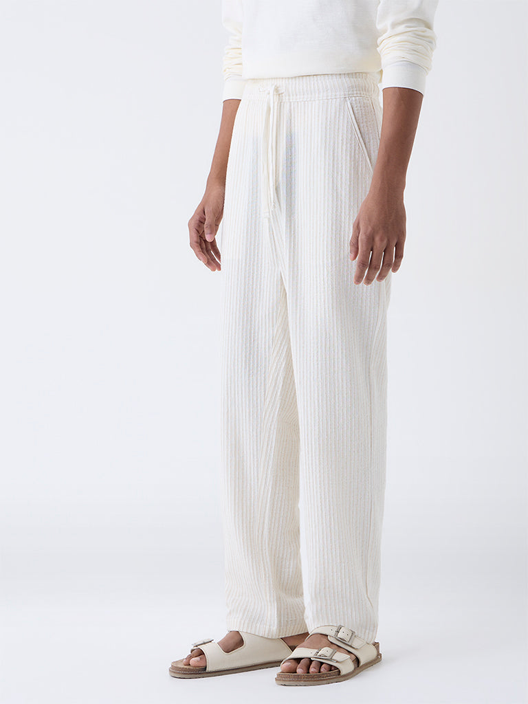 ETA Off-White Striped Relaxed-Fit Mid-Rise Cotton Pants