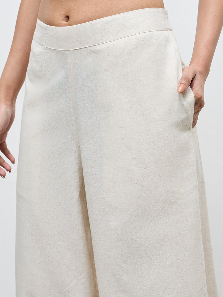 Utsa Off-White Solid Cotton-Blend Palazzos