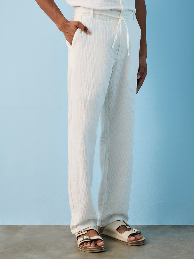 ETA Off-White Textured Relaxed-Fit Mid-Rise Cotton Pants
