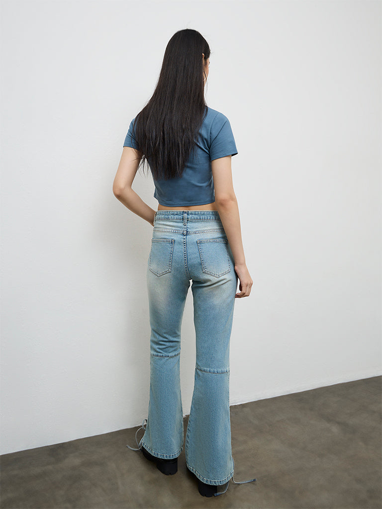 Nuon Light Blue Criss-Cross Detailed High-Rise Jeans