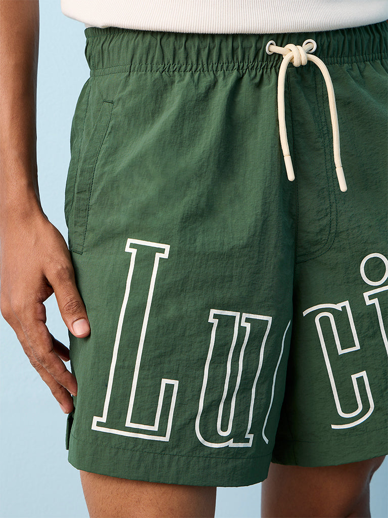 Nuon Green Text-Printed Loose-Fit Mid-Rise Shorts