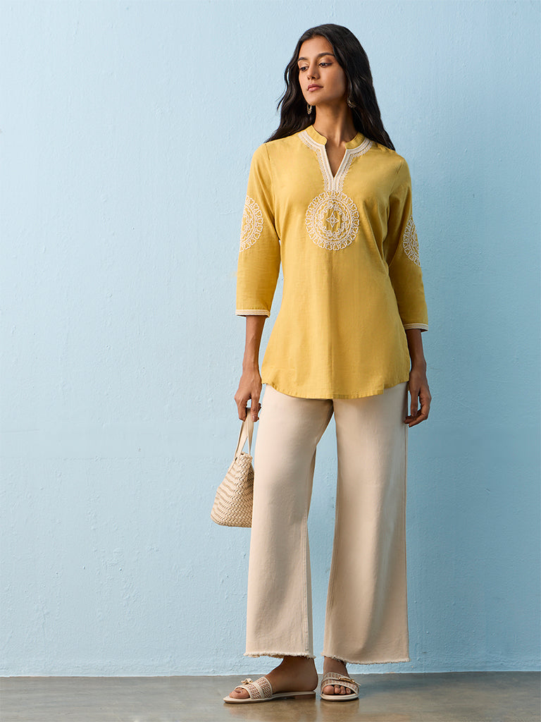 Utsa Yellow Embroidered Cotton Straight Kurti