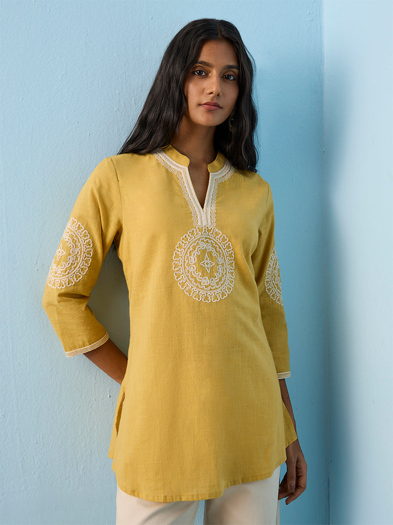 Utsa Yellow Embroidered Cotton Straight Kurti
