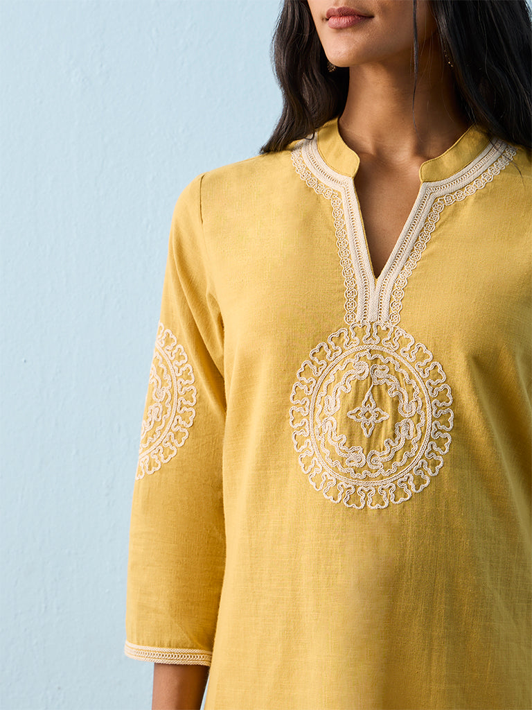 Utsa Yellow Embroidered Cotton Straight Kurti