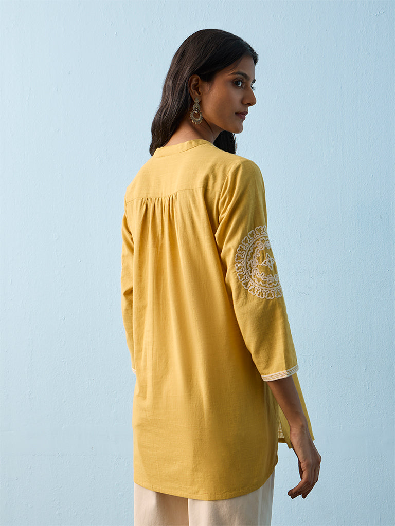 Utsa Yellow Embroidered Cotton Straight Kurti