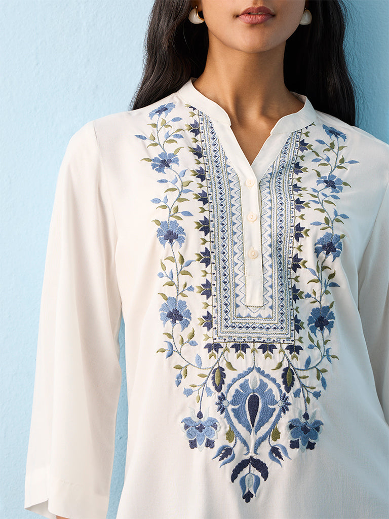 Utsa White Botanical Embroidered Straight Kurti