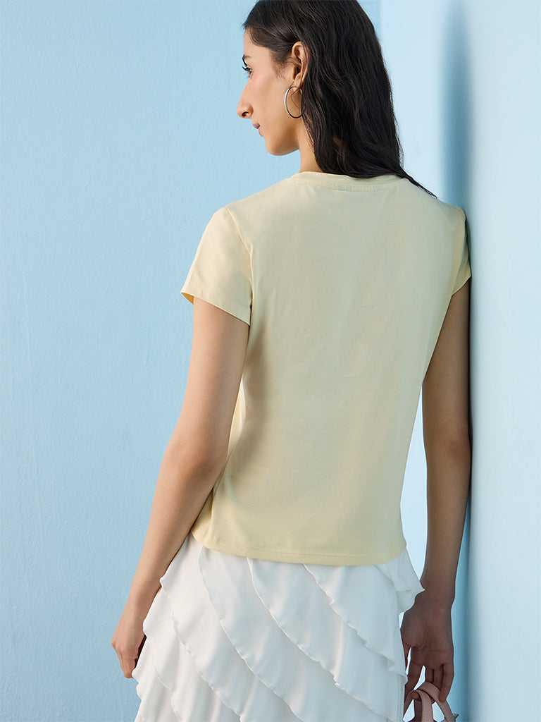 Nuon Light Yellow Typographic Cotton-Blend T-Shirt
