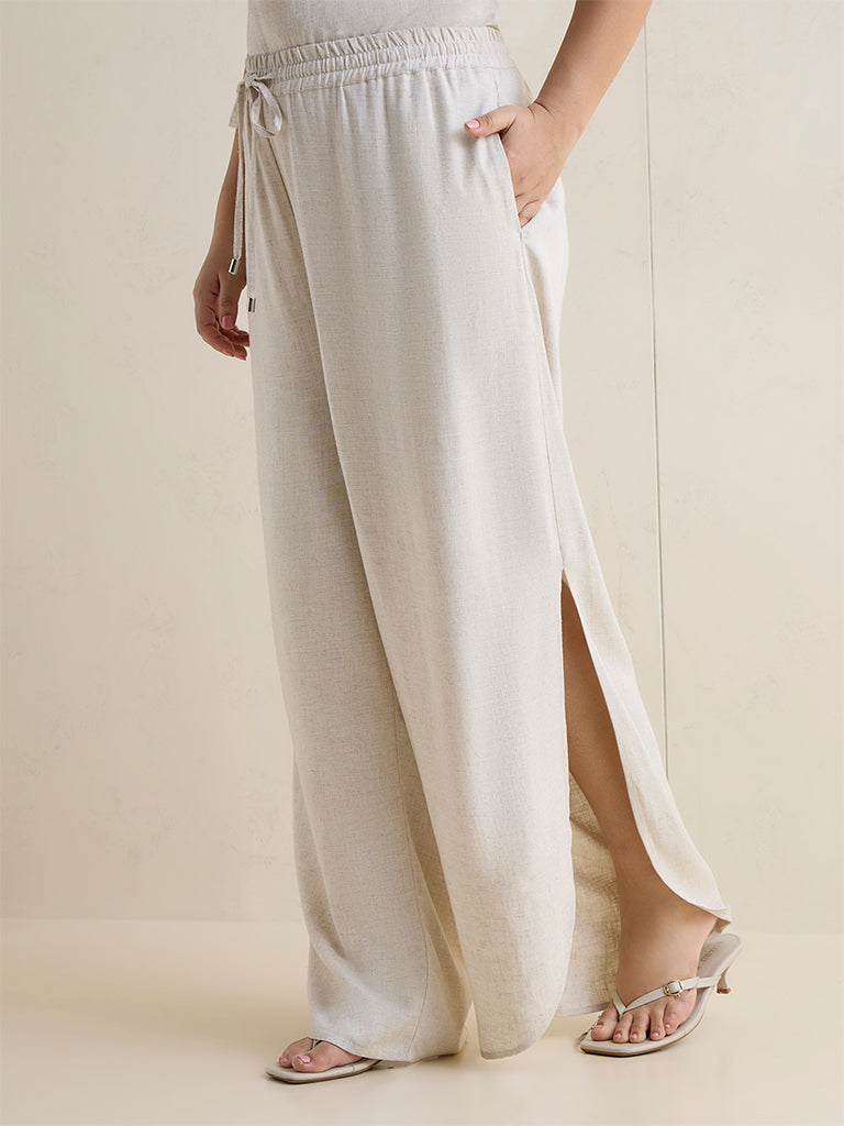 Gia Beige Slit Detailed High-Rise Cotton Trousers