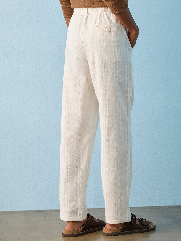 ETA Off-White Stripe Embroidered Relaxed-Fit Mid-Rise Cotton Chinos